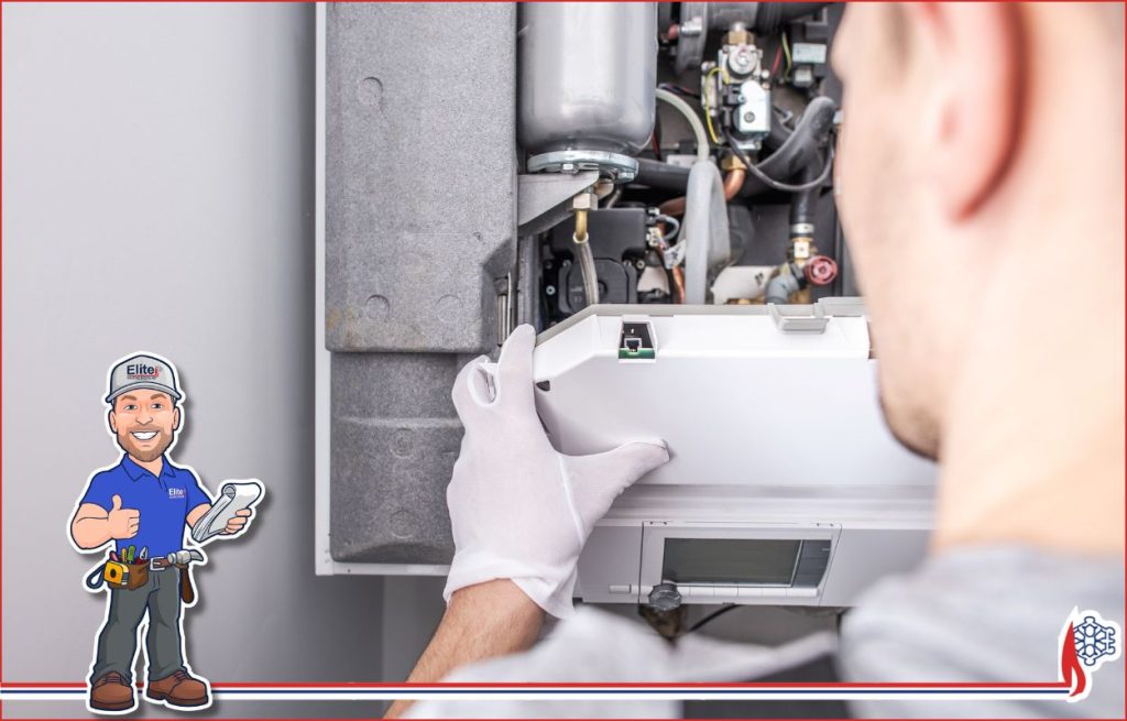 HVAC tech working on a furnace