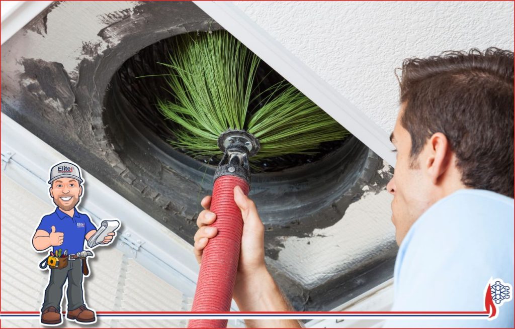 An HVAC tech cleaning ducts.